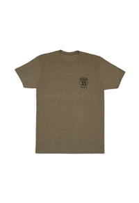 Olive green t-shirt with a small logo on the chest against a white background - big custom patches